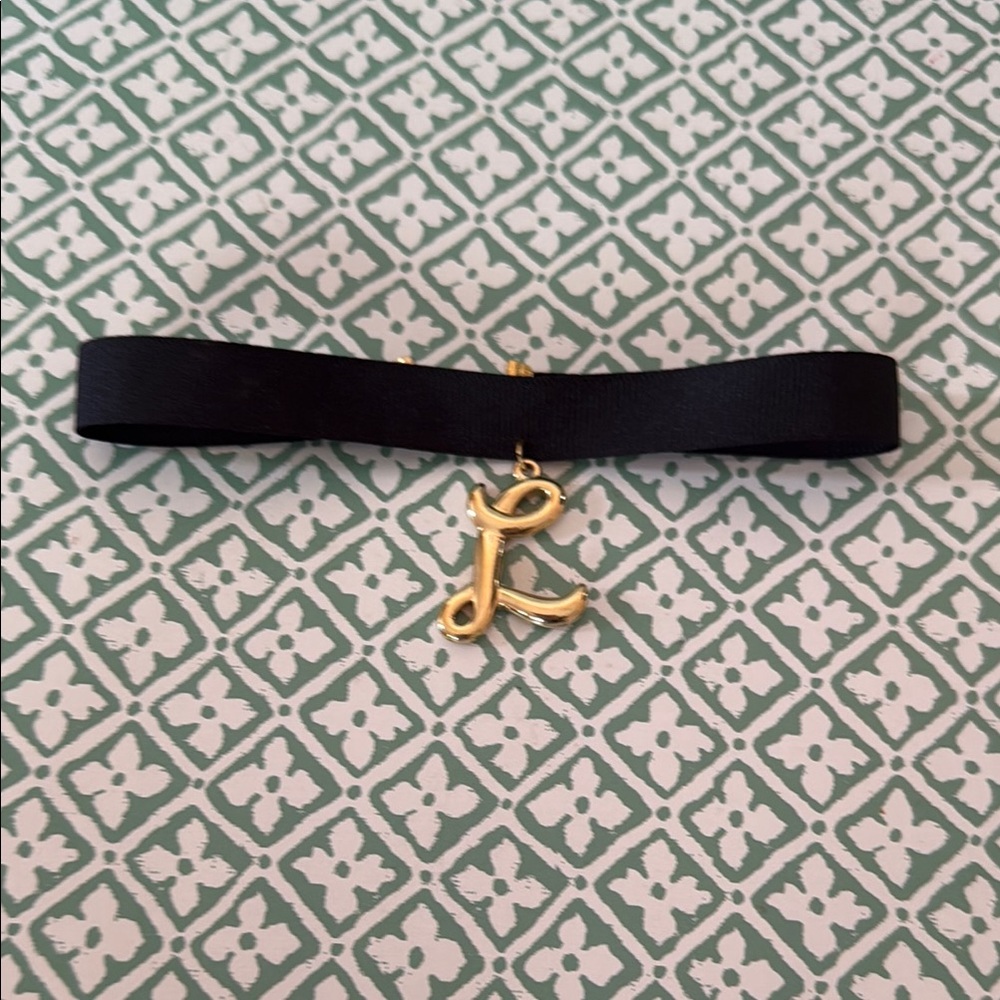 Elegant Black Ribbon Necklace with Gold Pendant